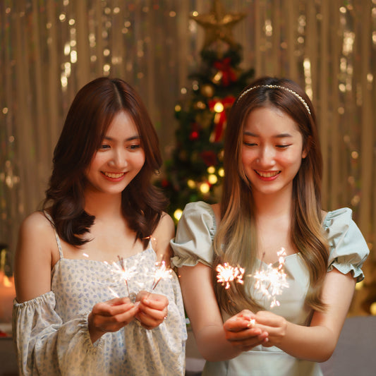 Women celebrating New Year with makeup